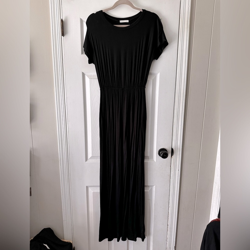 Black maxi dress with pockets.